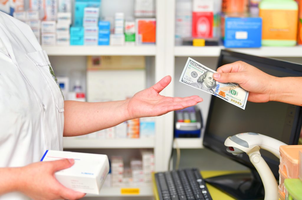 Customer paying in pharmacy